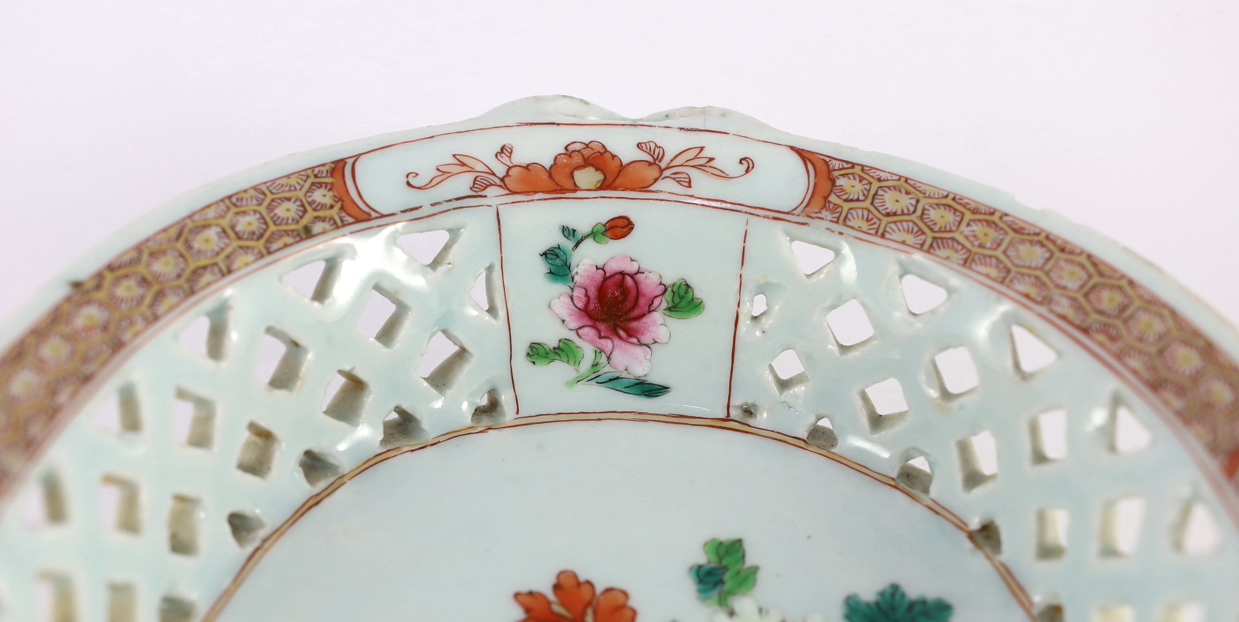 A Chinese famille rose oval two handled basket, Qianlong period, 31.5cm wide, chips to rim